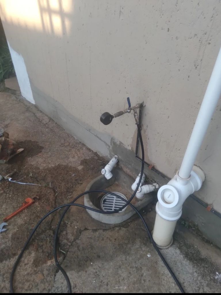 Drain pipe repair — exterior wall work