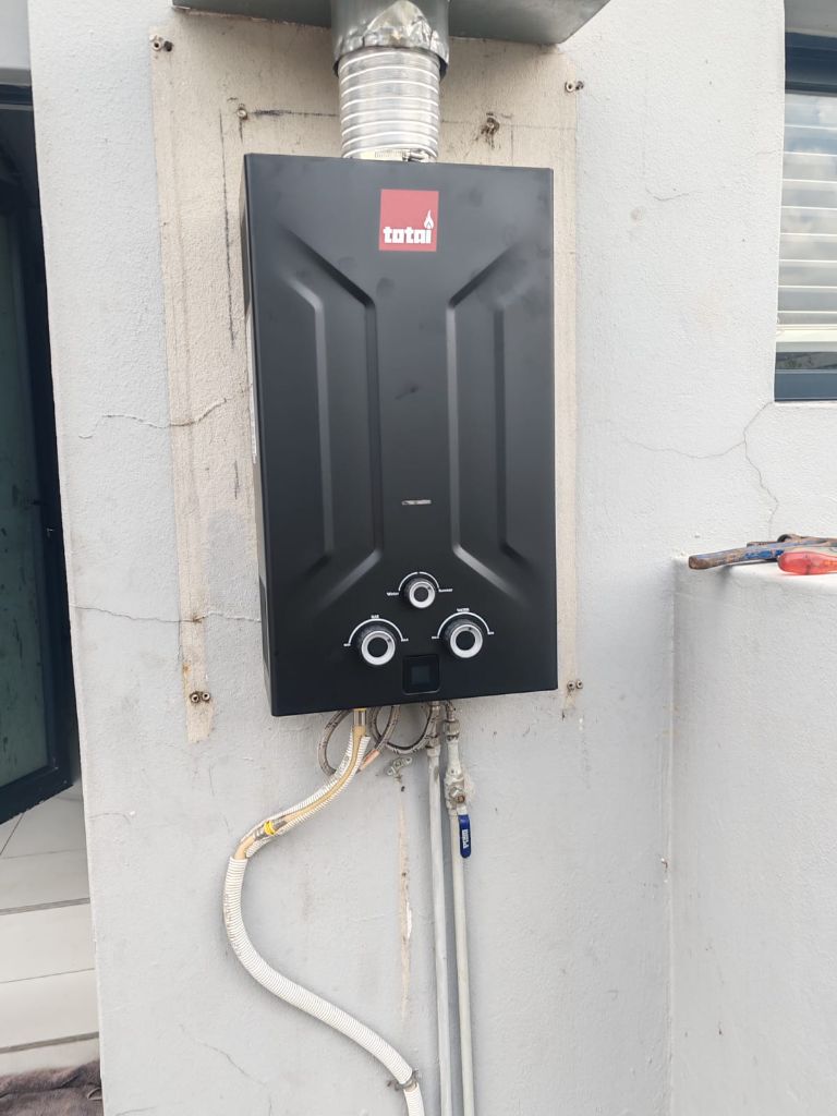 Totai gas geyser installed on exterior wall