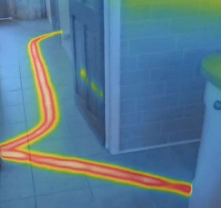 Thermal image showing heat signatures from pipe routes