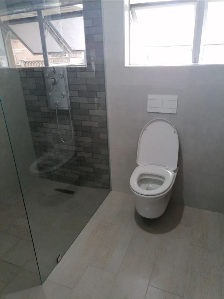 Completed bathroom renovation after leak repair